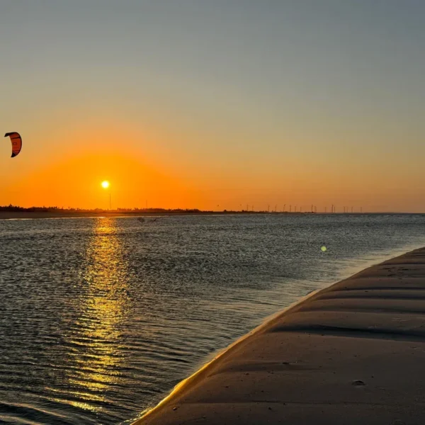Sunset over the water in Parajuru