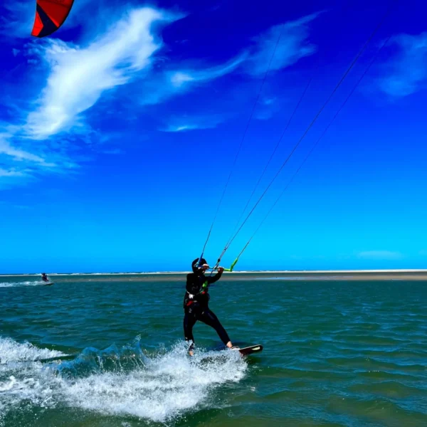 Kitesurfer riding flat water in Parajuru, Ceará