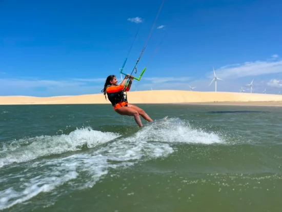 Kitesurfer jumping on the flat-water lagoon in Parajuru